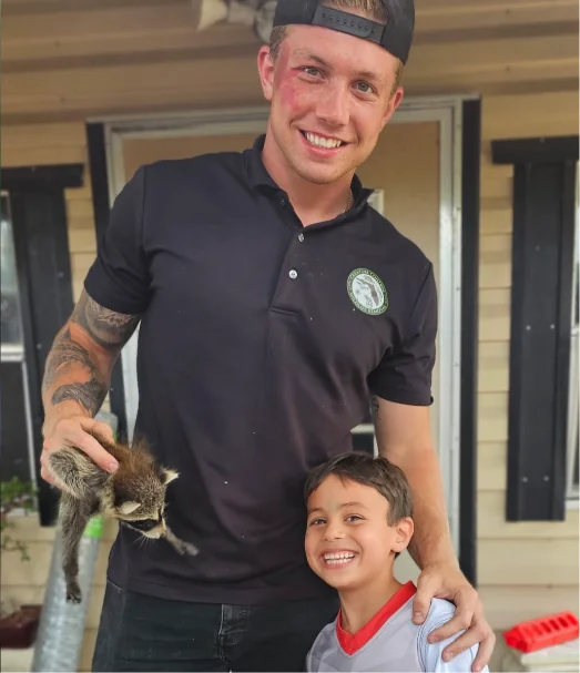 Licensed wildlife control technician providing humane animal removal in Central Florida